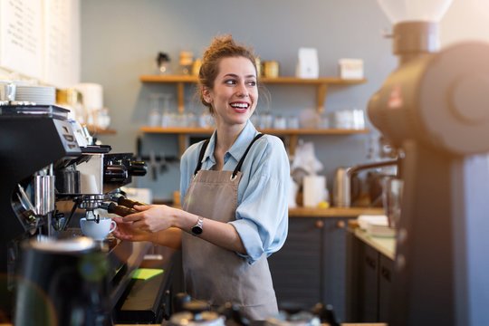 Barista working at a café machine