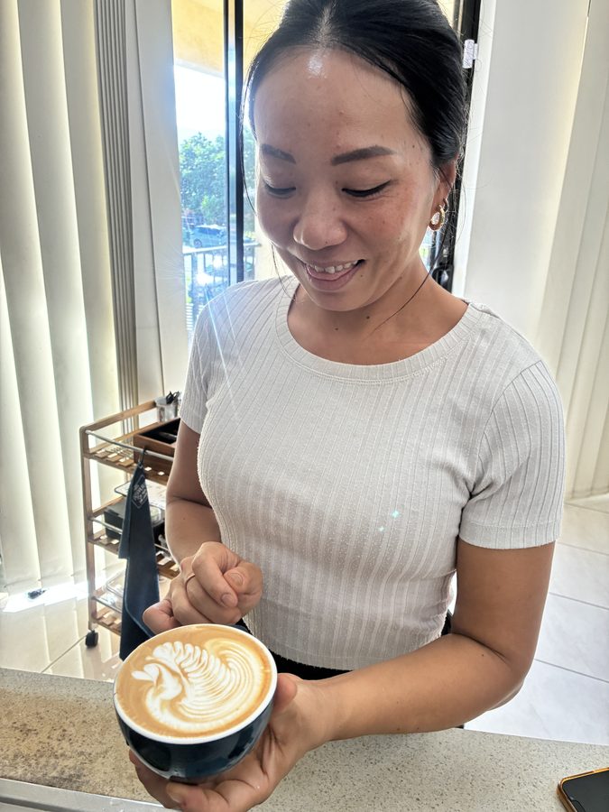 Student's first latte art pour