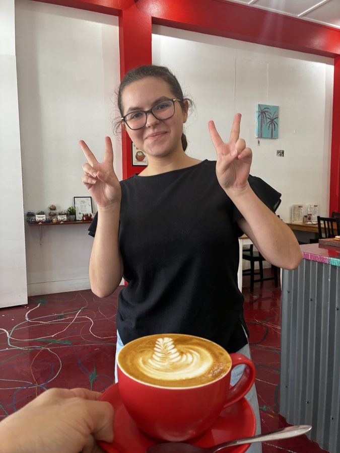 Student celebrating their latte art result